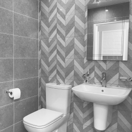 grey chevron pattern bathroom tiles